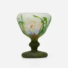 Coupe with daffodils by Daum, c. 1900, acid-etched, padded, and wheel-carved cameo glass, sold Sep 2022