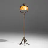 Damascene floor lamp by Tiffany Studios, c. 1910, patinated bronze, hand-blown Favrile glass, sold Sep 2022