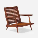 Cushion armchair by George Nakashima, 1957, walnut, upholstery, sold May 2022