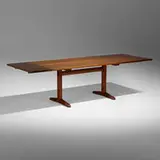 Trestle extension dining table by George Nakashima, 1968, American black walnut, rosewood, sold May 2022