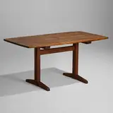 Trestle dining table by George Nakashima, 1979, American black walnut, rosewood, sold May 2022