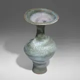Large bottle with flaring lip by Lucie Rie, c. 1979, glazed stoneware, sold May 2022