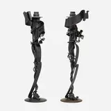 Albert Paley, Millennium candleholders, pair, 1998, forged and fabricated steel with a blackened finish, fixed brass bobeches (collars)
