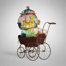 Michael Lucero, Anthromorphic Jug Form, c. 1993, glazed and hand-painted earthenware, repurposed baby carriage