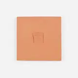 Petit carré avec soleil tile by Pablo Picasso, 1971, red earthenware, sold May 2022