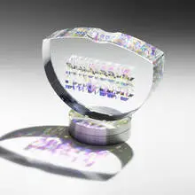 Retro Curve by Toland Sand, 2002, ground, polished, and laminated optical crystal, stainless steel, sold May 2022