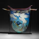 William Morris, Hanging Petroglyph, 1991, hand-blown glass, hot sculpted glass, enameled metal stand