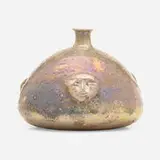 Vase with masks by Beatrice Wood, lustre-glazed earthenware, sold May 2022