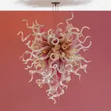 Clear and Cranberry Chandelier with Gold Leaf by Dale Chihuly, 1998, hand-blown glass, steel, sold May 2022