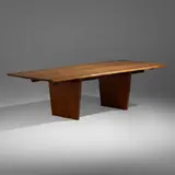 Minguren III conference/dining table by George Nakashima, 1986, American black walnut, rosewood, sold May 2022