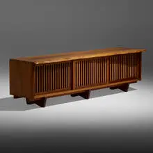 George Nakashima, Exceptional room divider, 1979, Persian walnut, pandanus cloth