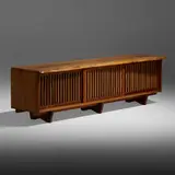 Exceptional room divider by George Nakashima, 1979, Persian walnut, pandanus cloth, sold May 2022