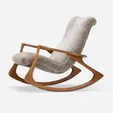Sculpted rocking chair by Vladimir Kagan, walnut, upholstery, sold May 2022