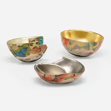 Collection of three bowls by Bennett Bean, c. 1990, pit-fired, hand-painted, and gilt earthenware, sold May 2022