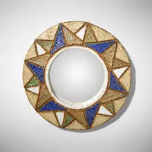 Wall mirror by Les Argonautes, c. 1960, glazed stoneware, mirrored glass, sold Jun 2025