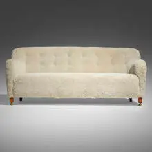 Jacob Kjær, Sofa, c. 1955, stained beech, sheepskin, brass
