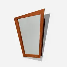 Mirror by Wharton Esherick, c. 1960, cherry, mirrored glass, sold May 2022