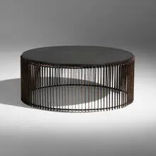 Drum coffee table by Paul Evans, 1962, steel, gold leaf, cleft slate, sold May 2022