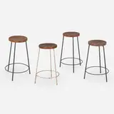 Stools from Chandigarh, set of four by Pierre Jeanneret, c. 1960, painted steel, teak, sold Jun 2025