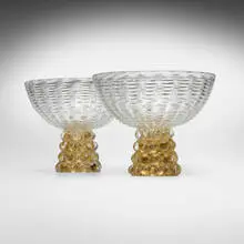 A Base Gemmata vessels, pair by Ercole Barovier, 1940, internally decorated glass with gold inclusions, sold Jun 2025