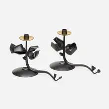 Tuft candleholders, pair by Albert Paley, 2001, forged mild steel with a blackened patina, removable brass bobeches (collars), sold Jan 2022