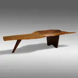 Slab coffee table by George Nakashima, 1960, English walnut, sold Jan 2022