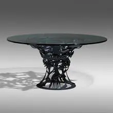 Breakfast table by Albert Paley, 2006, forged and fabricated steel with a blackened finish, glass, sold Jan 2022