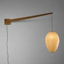 Akari light sculpture, model 24A with wall-mounted stem by Isamu Noguchi, washi paper, bamboo, elm, sold Apr 2025