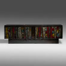 Deep Relief cabinet, model PE 42 by Paul Evans, 1970, torch-cut, welded, polychromed and patinated steel, cleft slate, enameled and papered wood, sold Jan 2022