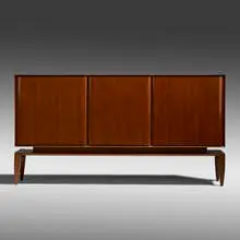 Cabinet by Gio Ponti, c. 1950, mahogany, brass, sold Jan 2022