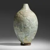 Gertrud and Otto Natzler, Round bottle form, 1960, earthenware with Blue Grey Flowing Lava glaze, artist-made stand