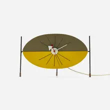 Watermelon table clock, model 2219B by George Nelson & Associates, 1954, lacquered wood, aluminum, steel, rubber, sold Apr 2025