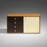 Miniature cabinet, model 5211 by George Nelson & Associates, 1952, rosewood, lacquered wood, porcelain, sold Apr 2025