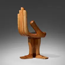 Hand Foot chair by Pedro Friedeberg, c. 1975, stacked laminated Mexican walnut, sold Apr 2025