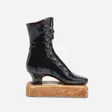 Rare boot novelty by Joseph Fortune Meyer for New Orleans Art Pottery, c. 1888, molded and glazed earthenware, sold Jan 2022