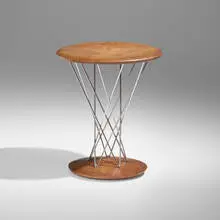 Rocking stool, model 86T by Isamu Noguchi, 1955, walnut, chrome-plated steel, sold Apr 2025