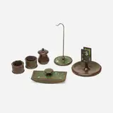 Collection of six Grapevine desk articles by Tiffany Studios, c. 1906, patinated bronze, Favrile glass, glass, horsehair, velvet, paper, sold Jan 2022