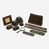Collection of eleven Chinese desk articles by Tiffany Studios, c. 1911, patinated bronze, glass, sold Jan 2022