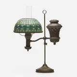 Pomegranate student lamp by Tiffany Studios, c. 1900, leaded glass, patinated bronze, clear glass, sold Jan 2022