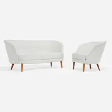 Settee, model 319 and lounge chair by Ingemar Thillmark, c. 1955, upholstery, stained beech, sold Apr 2025