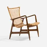 Ib Kofod-Larsen, Armchair, c. 1955, caning, beech, brass