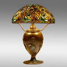 Tiffany Studios, Rare Peacock table lamp with Turtleback base, c. 1900, leaded glass, Favrile glass, patinated bronze