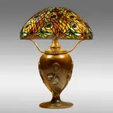 Rare Peacock table lamp with Turtleback base by Tiffany Studios, c. 1900, leaded glass, Favrile glass, patinated bronze, sold Jan 2022