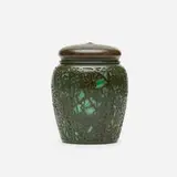Grapevine humidor by Tiffany Studios, c. 1906, patinated bronze, Favrile glass, sold Jan 2022