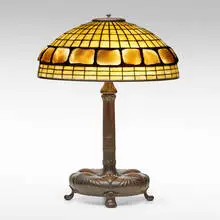 Turtleback table lamp by Tiffany Studios, c. 1910, leaded glass, Favrile glass, patinated bronze, sold Jan 2022