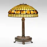 Turtleback table lamp by Tiffany Studios, c. 1910, leaded glass, Favrile glass, patinated bronze, sold Jan 2022