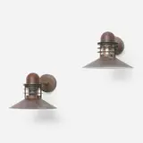 Nyhavn sconces, pair by Alfred Homann and Ole Kjær, 1976, patinated copper, glass, sold Apr 2025