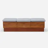 Phillip Lloyd Powell, Bench, c. 1970, carved walnut, cleft slate, upholstery, casters