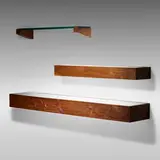 Phillip Lloyd Powell, Wall-hanging shelves, set of three, c. 1970, carved and sculpted walnut, glass