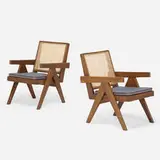 Lounge chairs from the Punjab Engineering College, Chandigarh, pair by Pierre Jeanneret, c. 1955, teak, cane, upholstery, sold Sep 2021